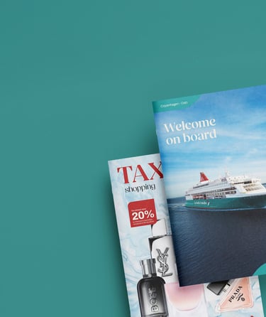 Promotional brochures featuring a cruise ship and tax-free shopping offers