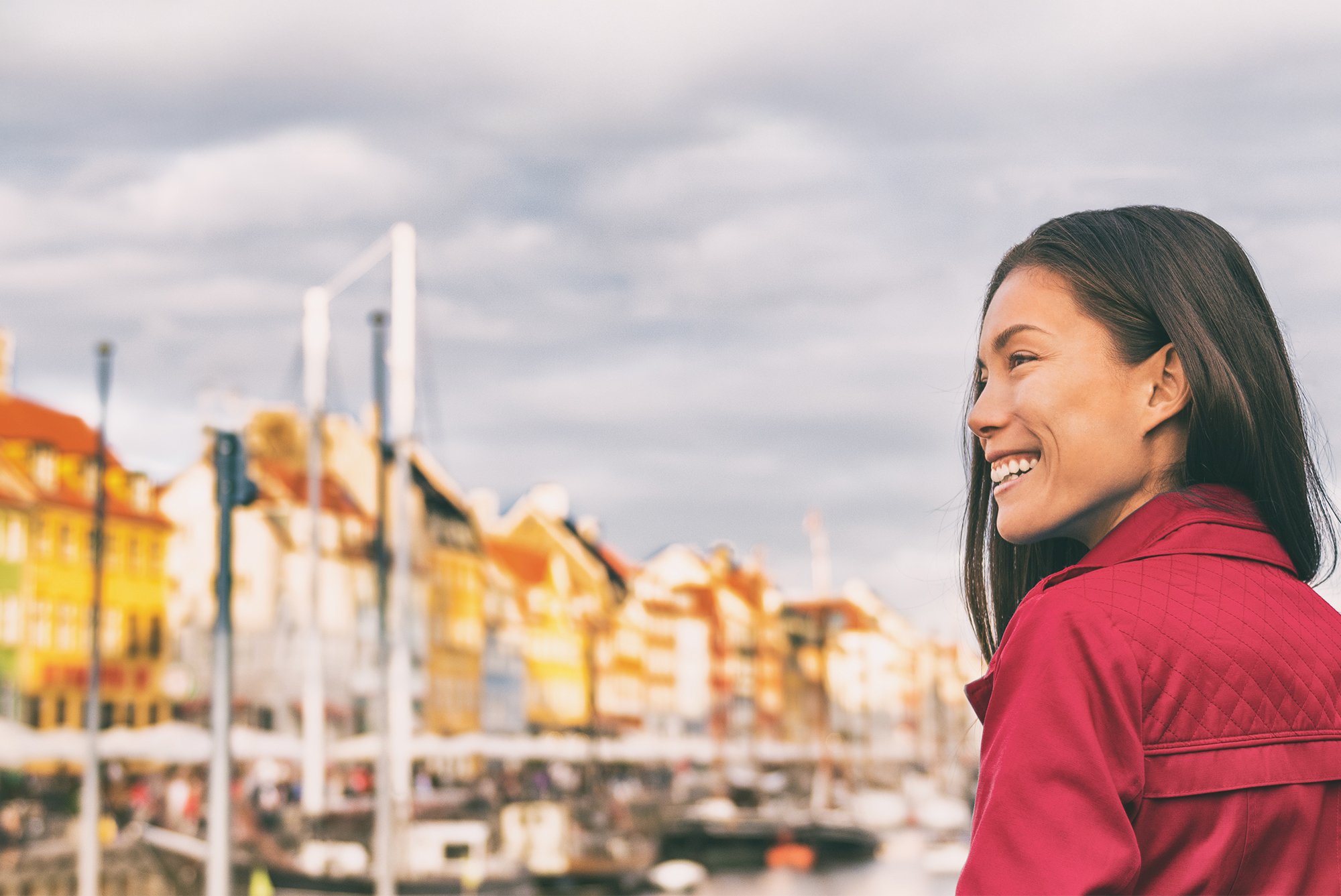 Woman looking out over Nyhavn