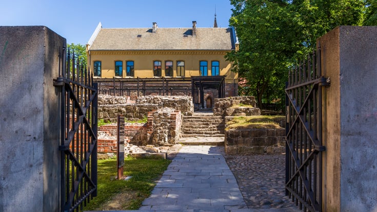 Historic building with stone steps and ruins