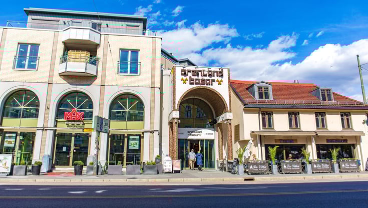 Street view with restaurants and pedestrians