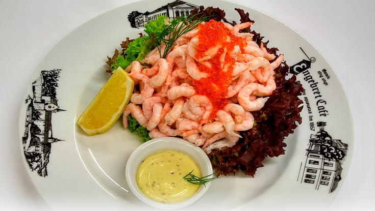 Shrimp dish with lemon and sauce at Engelbrekt Café in Oslo.