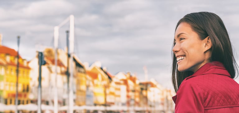 Woman looking out over Nyhavn