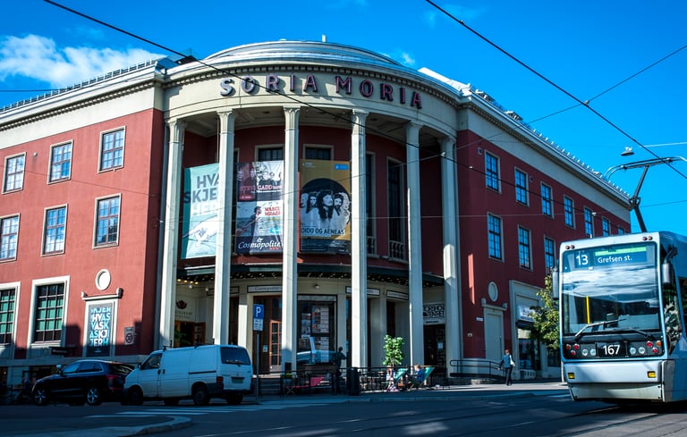 Red building with “Soria Moria” and tram
