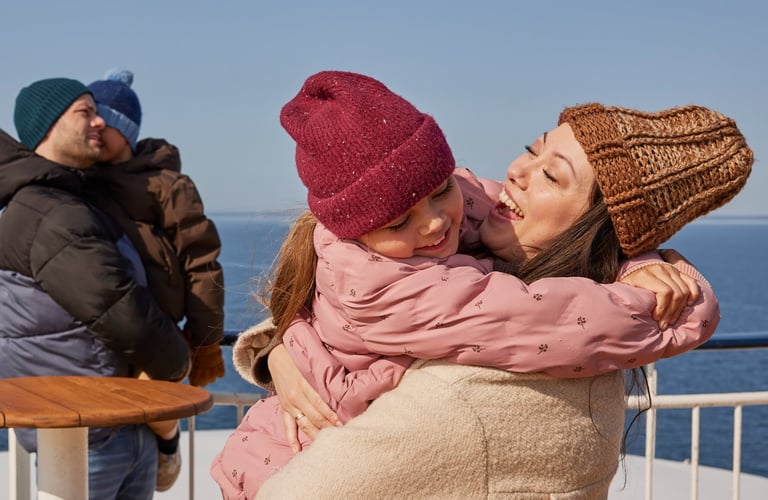 Happy family out on the deck in winter