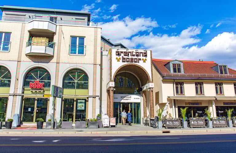 Street view with restaurants and pedestrians